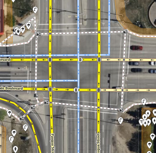 A screenshot of Regina's Rochdale/Pasqua crossing, as mapped in iD. Several separately mapped sidewalks, curb nodes, and intersection nodes are mapped.